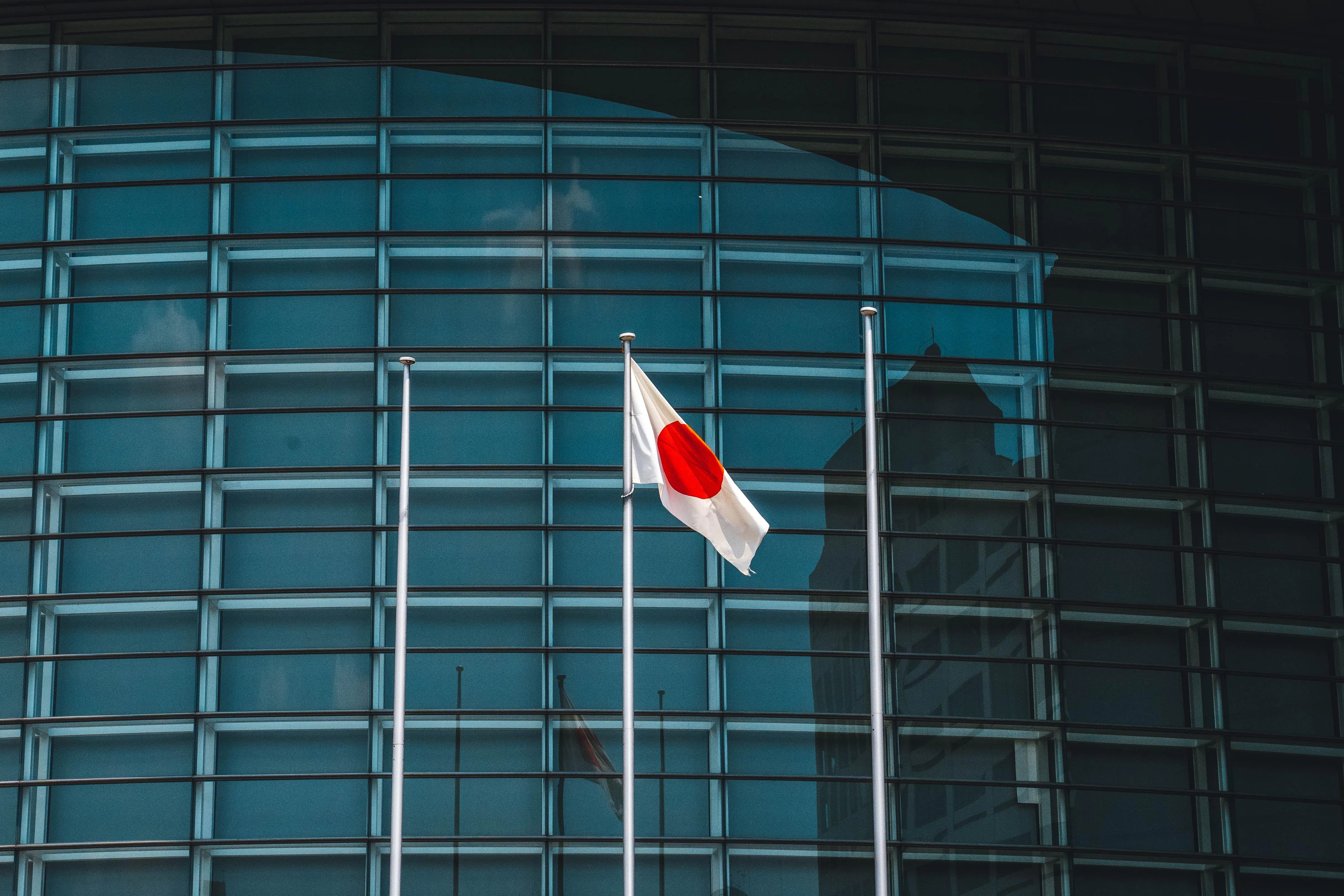 Japan avoids recession with weak return to growth – business live - 4