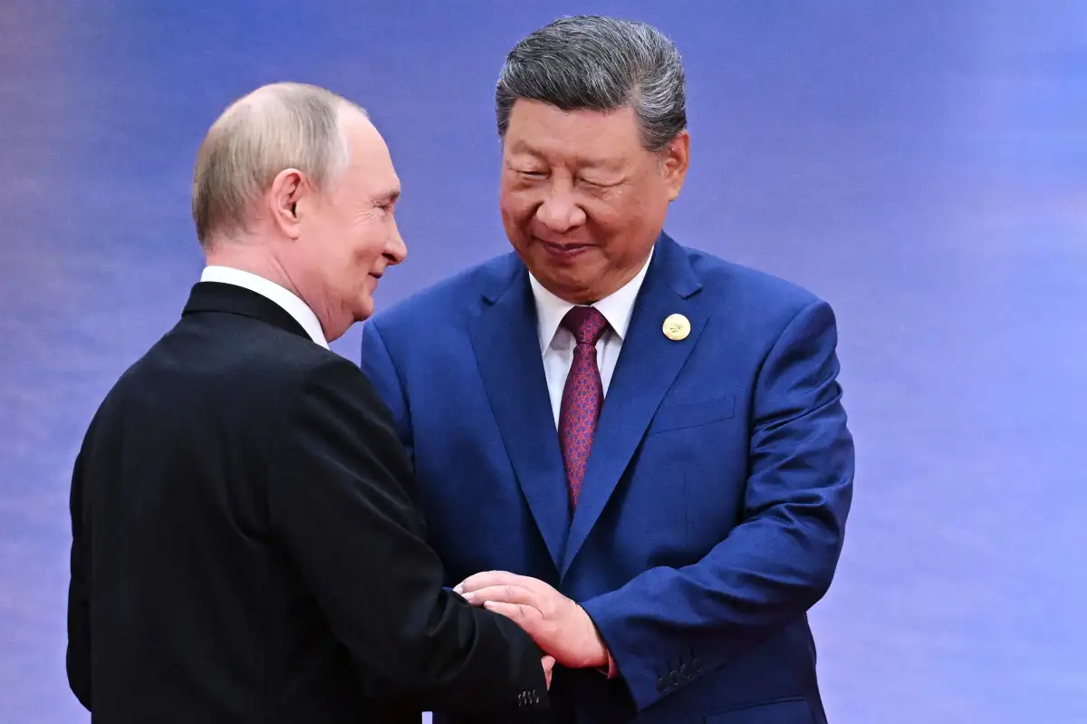 Putin visits China to reaffirm Russia ties - 2