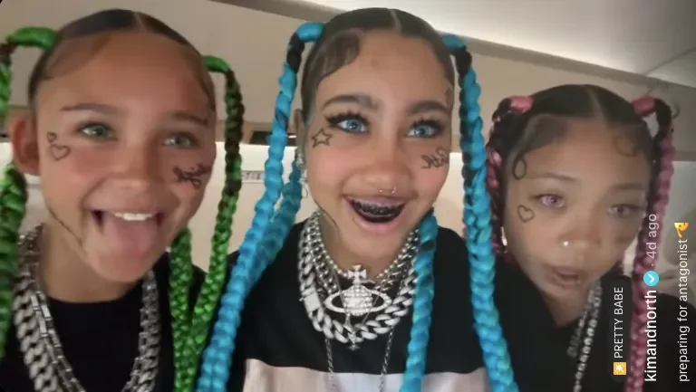 North West Shows Off Blue Lips and Face Piercings in New Video - 4