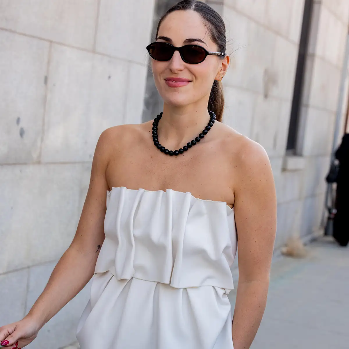 7 shorts and boots outfit ideas to elevate your go-to looks, ideal for transitional dressing this season - 2