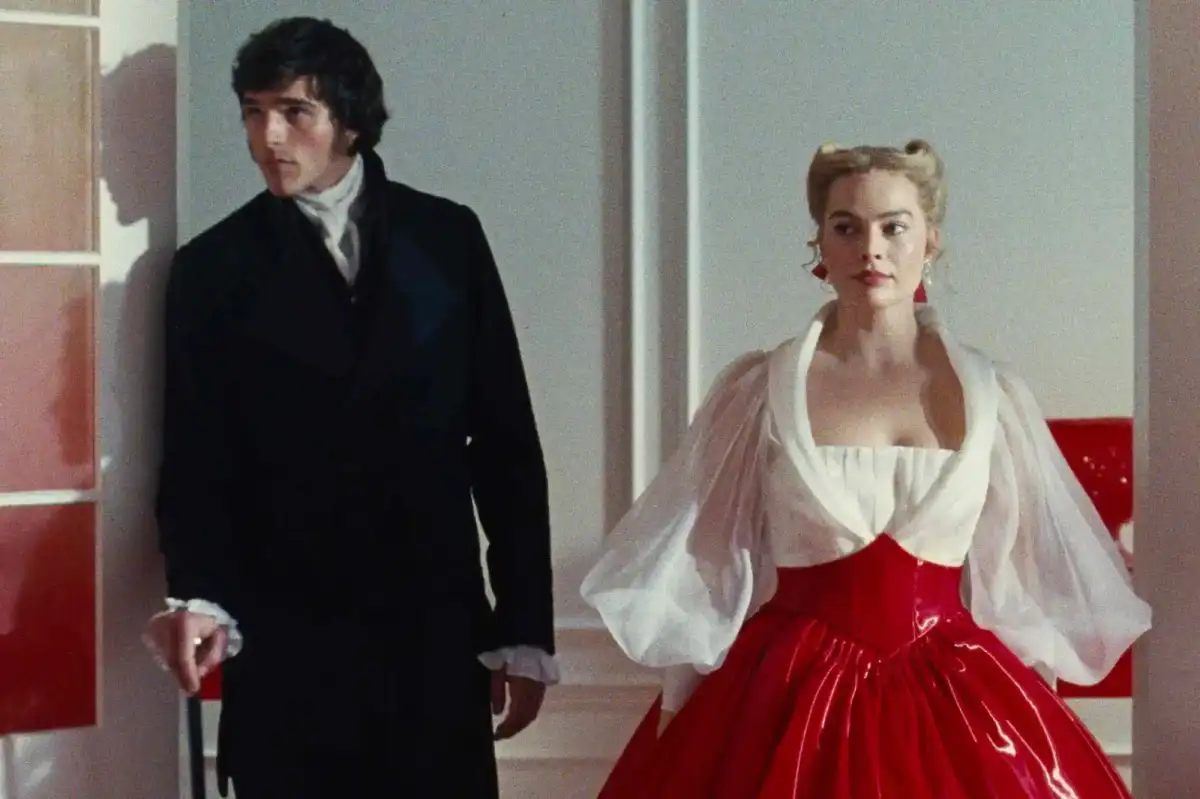 Wuthering Heights director Emerald Fennell says she regrets not showing star Margot Robbie's 'extremely hairy' armpits after the scene was cut from the film - 1