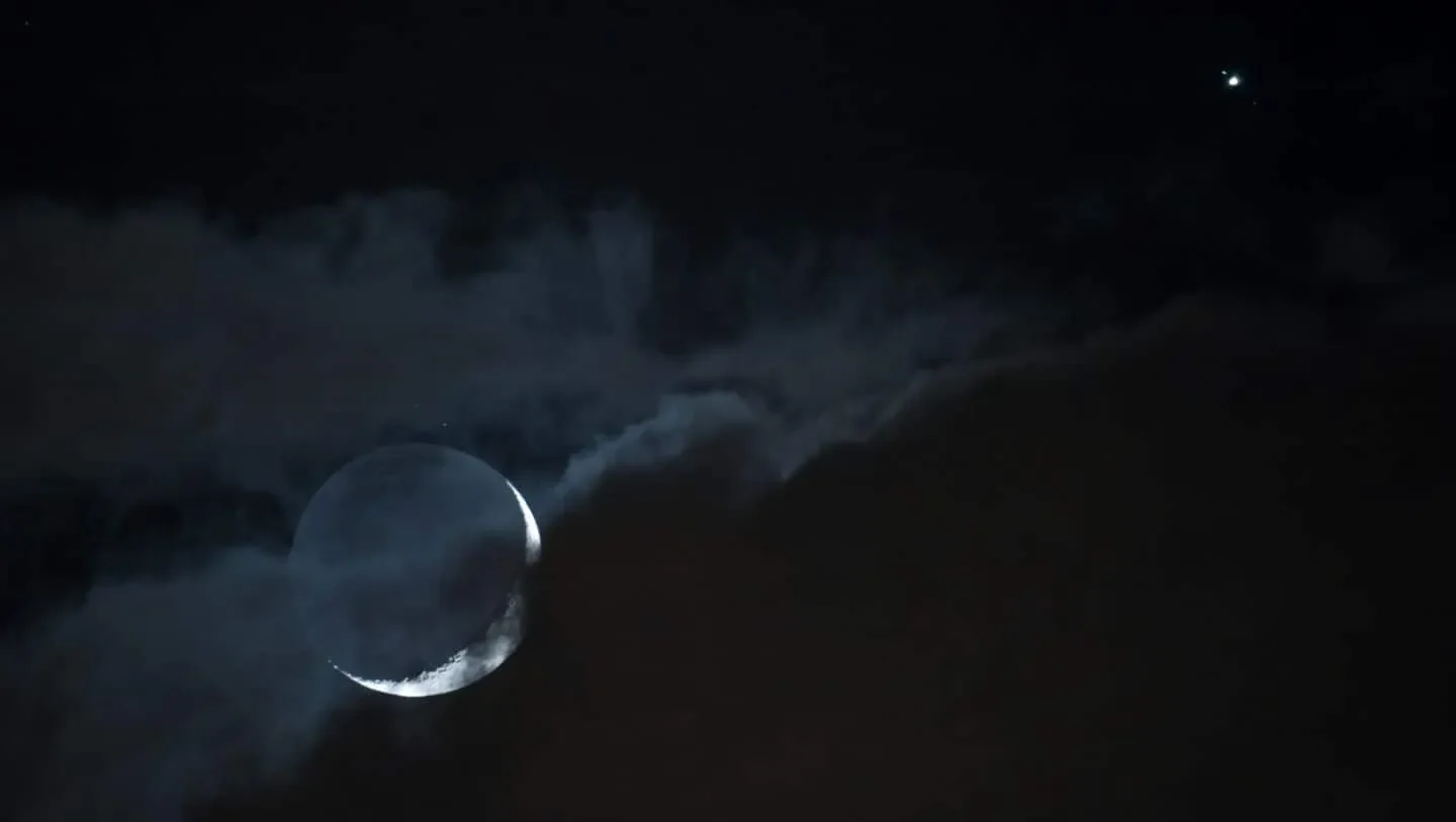 See Jupiter glow beside the waxing moon after sunset on May 20 - 1