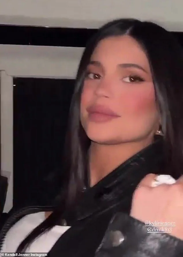 Kendall Jenner flashes abs in tight white tank top and shorts as she hits Coachella with sisters Kylie and Kourtney Kardashian - 2