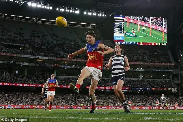 Is music ruining the footy? Fans and experts are divided as AFL matches start to resemble concerts - 3