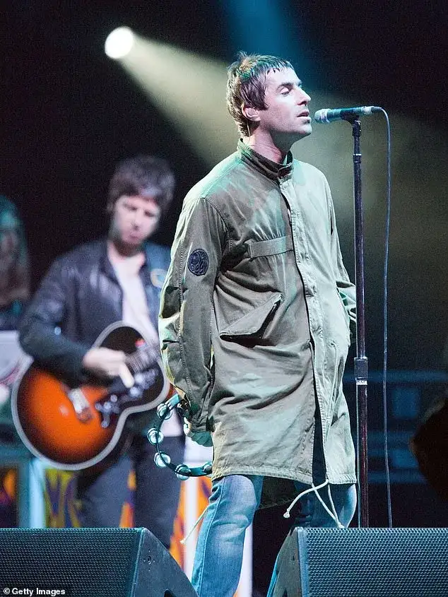 Oasis' Noel and Liam Gallagher put on animated display after Man City FA Cup win over Chelsea - 2