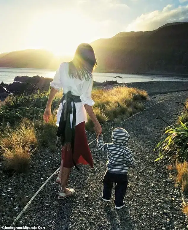 A day in the life of supermodel Miranda Kerr: Health-obsessed mum-of-four reveals her very strict routine from meditating with her children to 4.30pm dinner times - 4