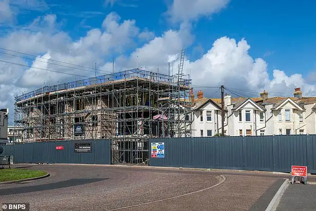 Mother whose sea view was blocked by illegal wall is shocked as council back developers who built it - 4