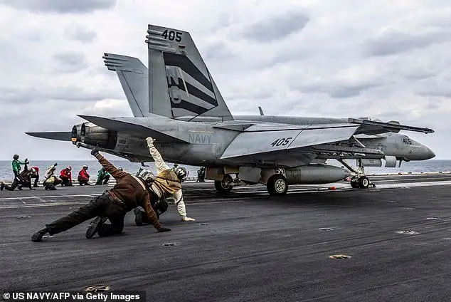 Chilling sign of Trump's 'imminent' Iran attack as more than 60 US warplanes swarm key army base - 1