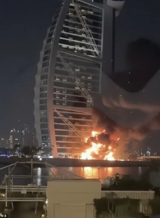 Dubai airport hit by Iran drone: Massive explosion as passengers ready to fly out are ordered off planes and terminals evacuated - 1