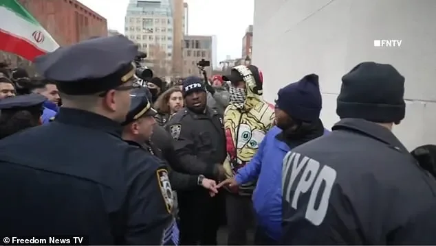 Moment vigil in NYC mourning the death of Iranian Supreme Leader descends into violence as punches thrown - 1