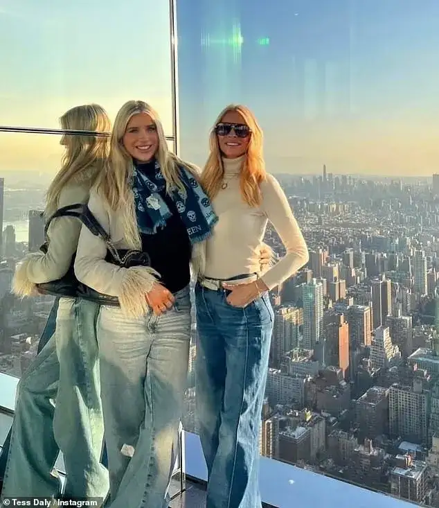Tess Daly wows as she twins with lookalike daughter Phoebe in matching pink beachwear on lavish holiday - 1