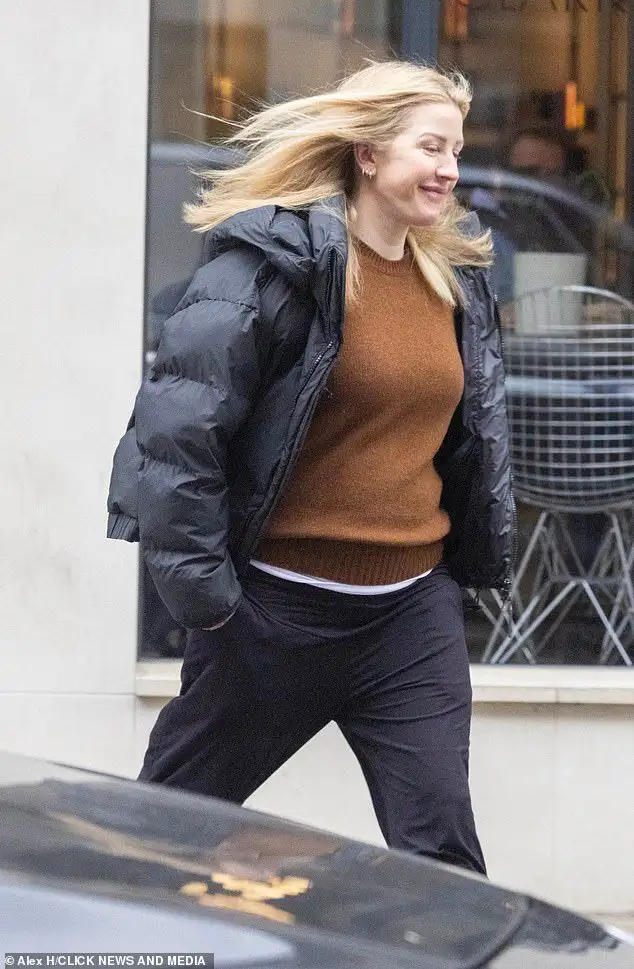 Ellie Goulding offers a rare glimpse of baby daughter Iris as she shares a candid snap of her breastfeeding - 4