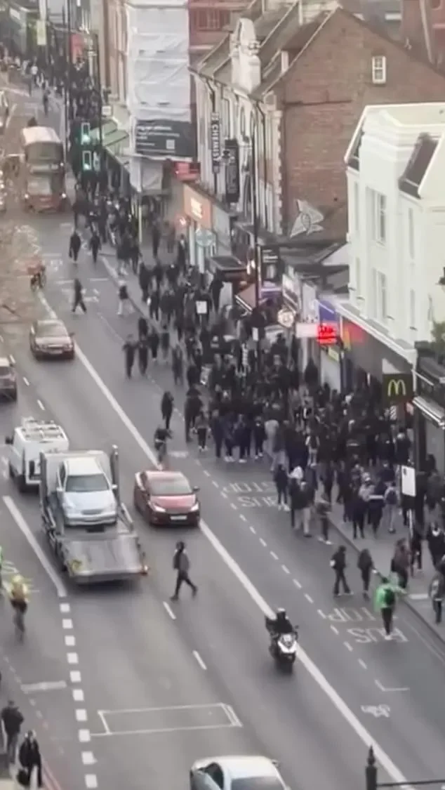 Children with zombie knives, hordes of feral teens smashing up shops and police officers battered. GUY ADAMS reveals truth behind Clapham chaos, the schools involved... and shadowy organisation at the heart of it - 1