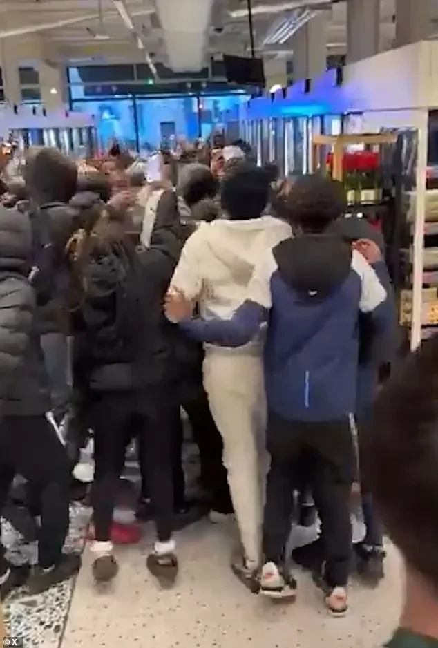 Children with zombie knives, hordes of feral teens smashing up shops and police officers battered. GUY ADAMS reveals truth behind Clapham chaos, the schools involved... and shadowy organisation at the heart of it - 2