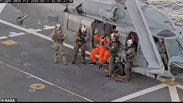 Artemis II astronauts struggle to walk as gravity hits them after 'bullseye' Pacific Ocean splashdown following their historic moon mission - 2