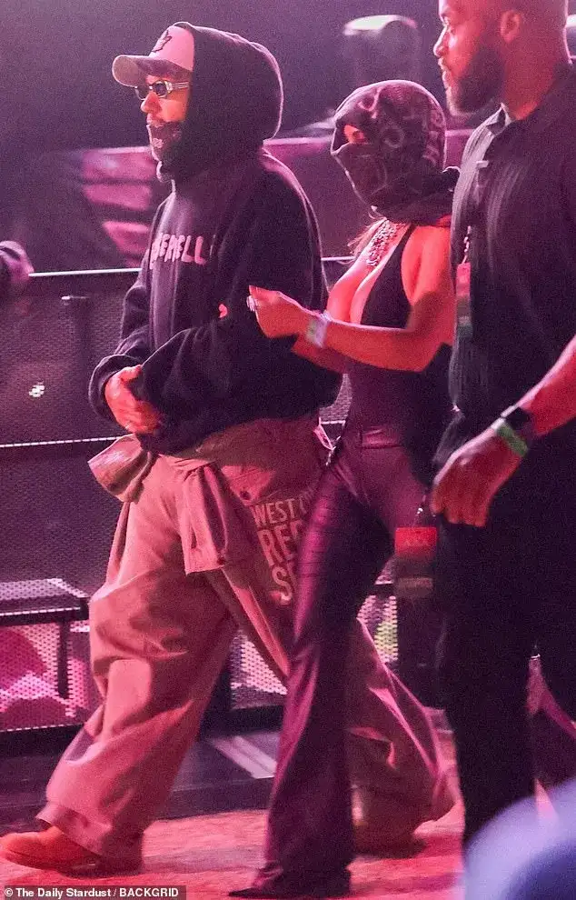 Kim Kardashian sweetly links arms with boyfriend Lewis Hamilton as romance heats up at Justin Bieber's Coachella set - 3