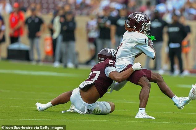 Disaster for college football team as captain gets carted off in game four months before season starts - 1