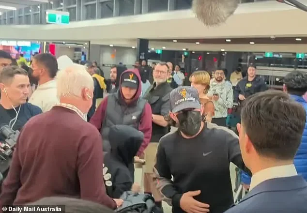Chaotic scenes as one ISIS bride walks free after landing in Australia while three more are dramatically arrested - 4