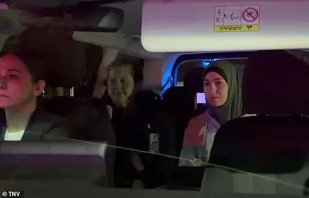 ISIS bride taken in by AFP on landing - 3