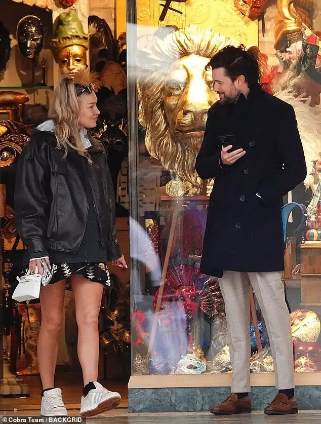 Newlyweds Jack Whitehall and Roxy Horner look engrossed by their phones as they minimoon in Venice after their £250,000 wedding - 3