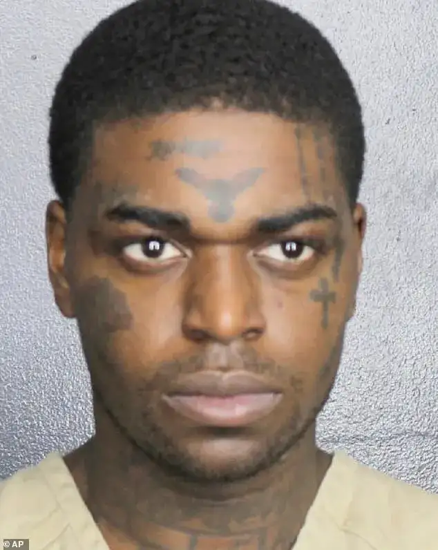 See Kodak Black's bleary-eyed mugshot as rapper is arrested for SECOND time in eight days - 2