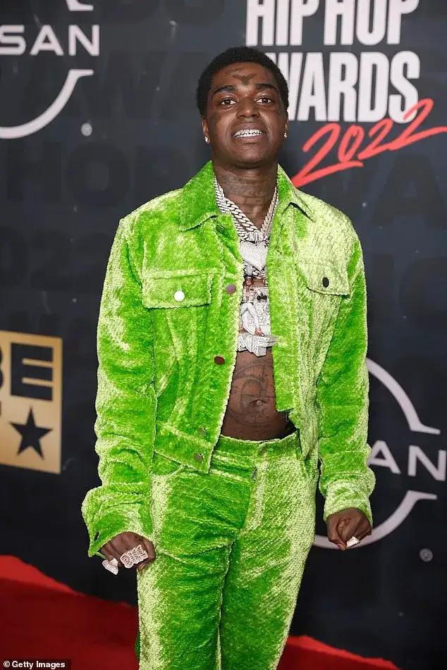 See Kodak Black's bleary-eyed mugshot as rapper is arrested for SECOND time in eight days - 1
