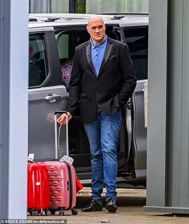 Paris and Tyson Fury gather their five young children and pack their designer luggage as they depart the Comis Hotel following daughter Venezuela's wedding - 4