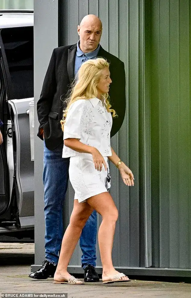 Paris and Tyson Fury gather their five young children and pack their designer luggage as they depart the Comis Hotel following daughter Venezuela's wedding - 2