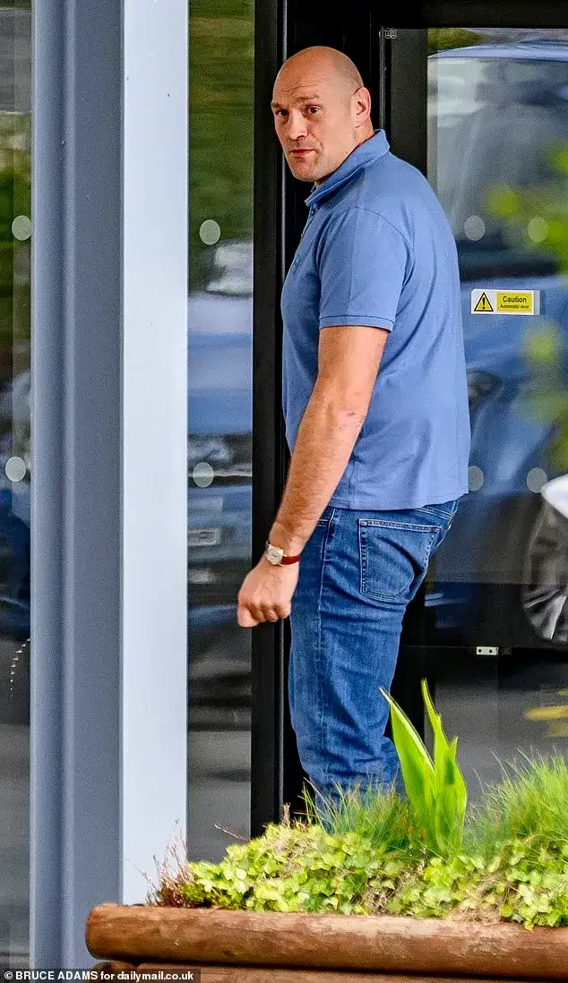 Paris and Tyson Fury gather their five young children and pack their designer luggage as they depart the Comis Hotel following daughter Venezuela's wedding - 1