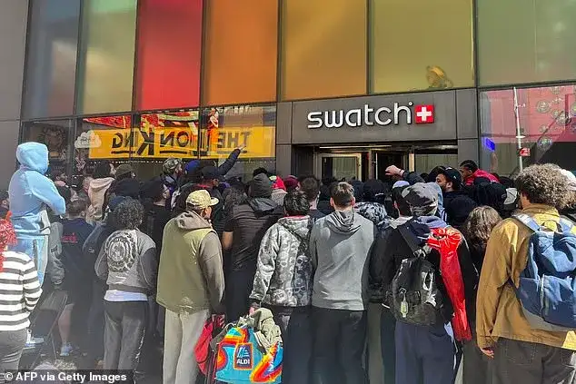 Why are there brawls across the globe over a WATCH? Violent scenes unfold in Europe after UK and US Swatch stores were forced to close their doors - with police dog handlers called in - 1
