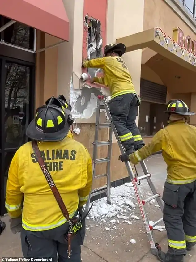 Man plunges 22 feet off movie theater roof into wall space and is only rescued 12 hours later when customers heard muffled cries for help - 1