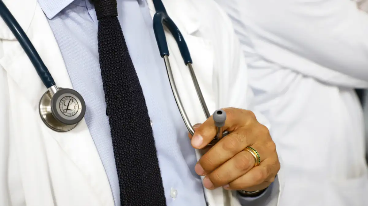 Doctor who called junior colleague 'bad girl' and squeezed her waist is struck off - 3