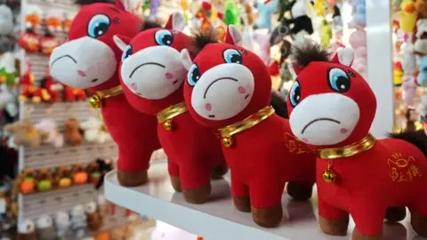 Slate Crossword: Plushie Made for Lunar New Year That Went Viral After Its Smile Came Out Upside Down (11 Letters) - 1