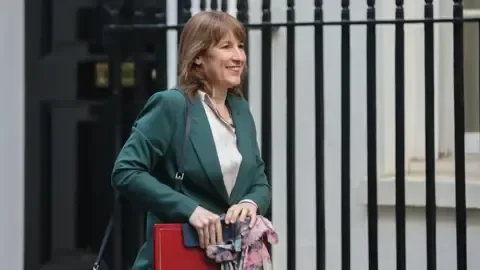 Higher tax helped UK government reach record January surplus - 1