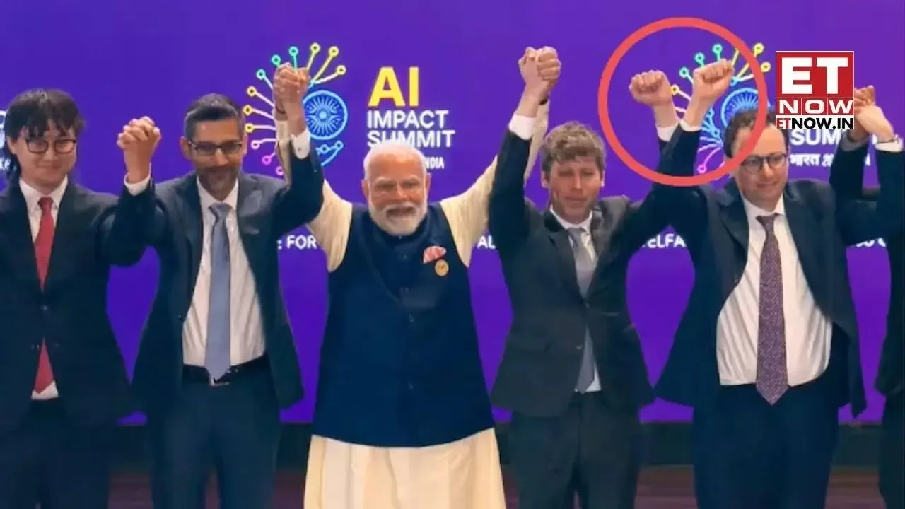 Viral moment as AI leaders refuse to hold hands at India event - 4