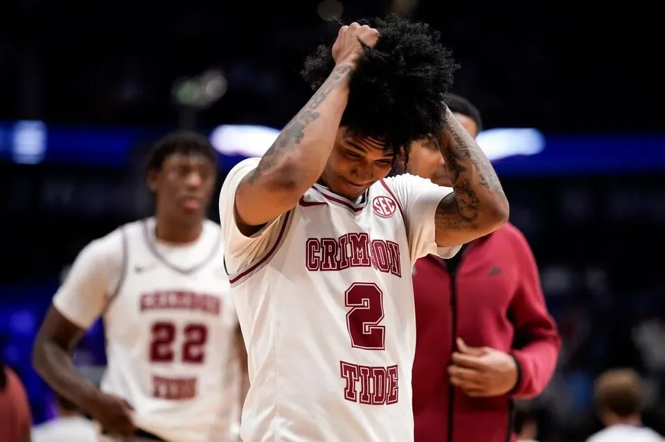 Tide's Holloway to enroll in fall, aims to play again - 4