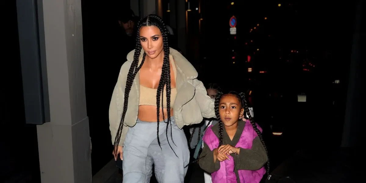 North West Shows Off Blue Lips and Face Piercings in New Video - 3