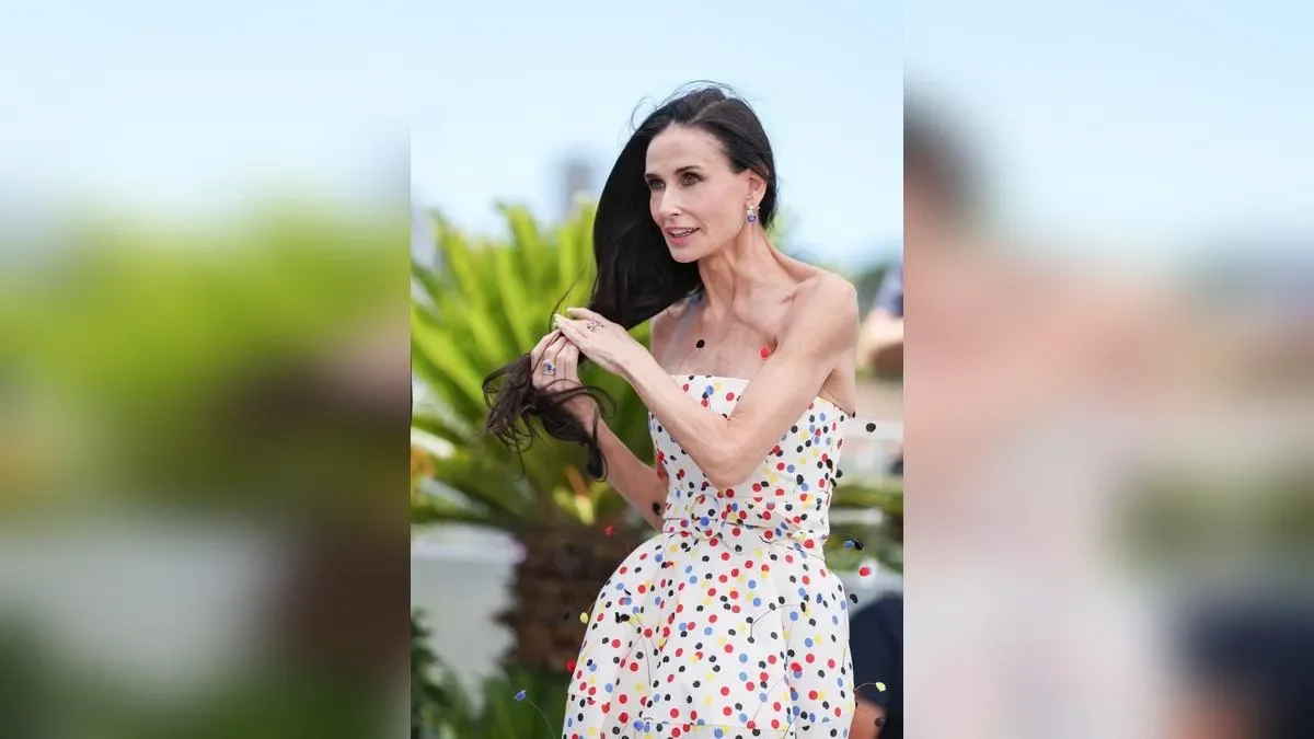 Demi Moore, 63, ditches the glamorous gowns for a stylish co-ord as she attends her THIRD event of the night at the 79th Cannes Film Festival - 2