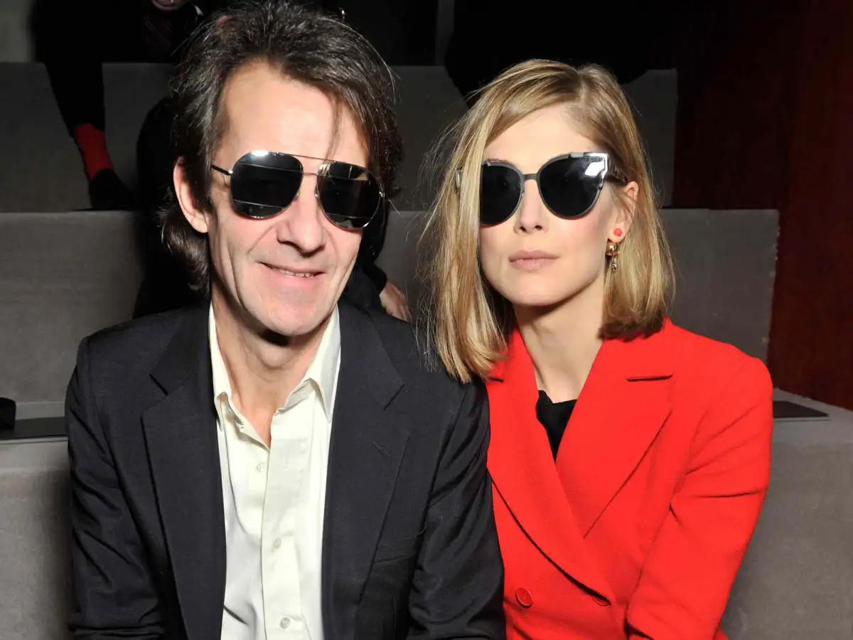 Rosamund Pike, 47, makes a rare appearance with her partner Robie Uniacke 65, at the Olivier Awards after hinting they have secretly married - 1