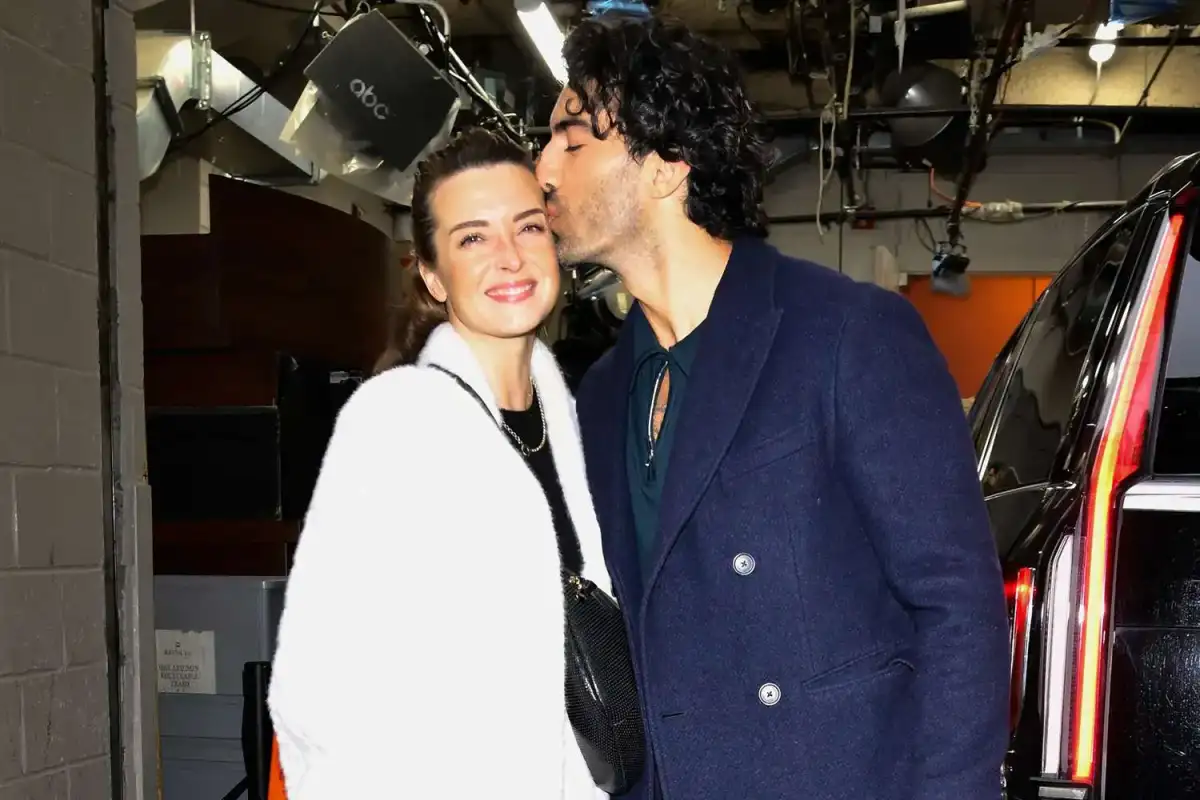 The photos that say it all! Justin Baldoni beams as he steps out with his wife for the first time since Blake Lively's humiliating lawsuit settlement - 1