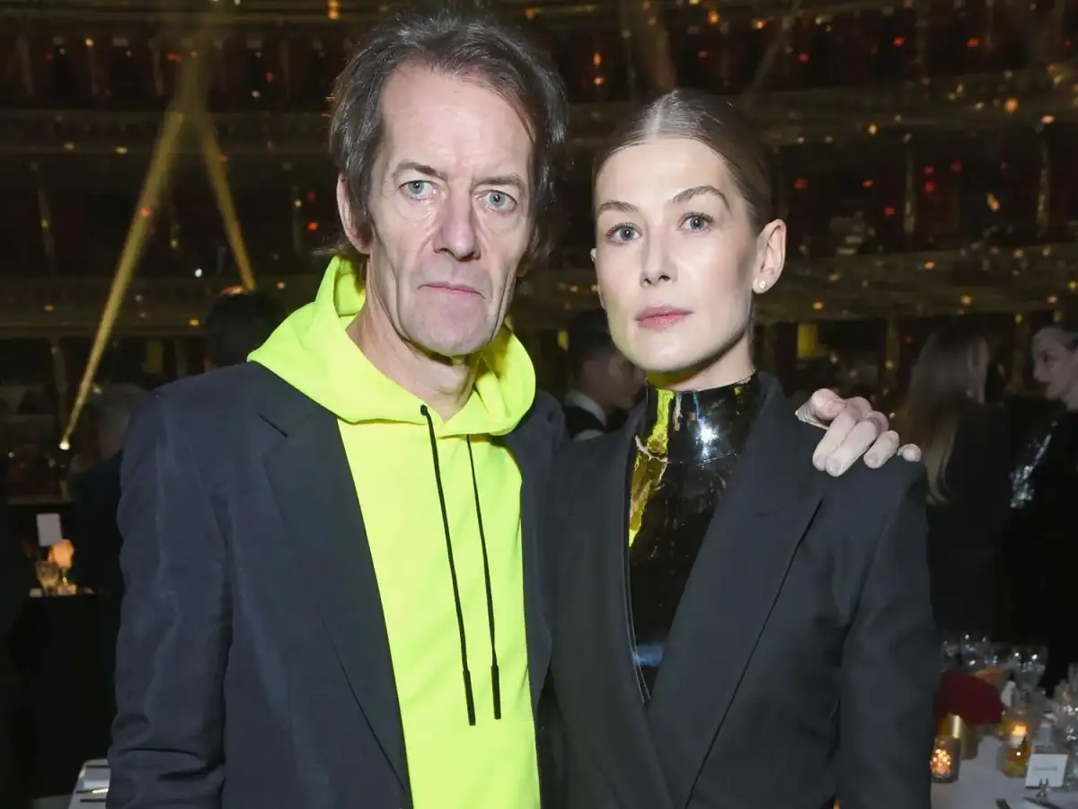 Rosamund Pike, 47, makes a rare appearance with her partner Robie Uniacke 65, at the Olivier Awards after hinting they have secretly married - 4