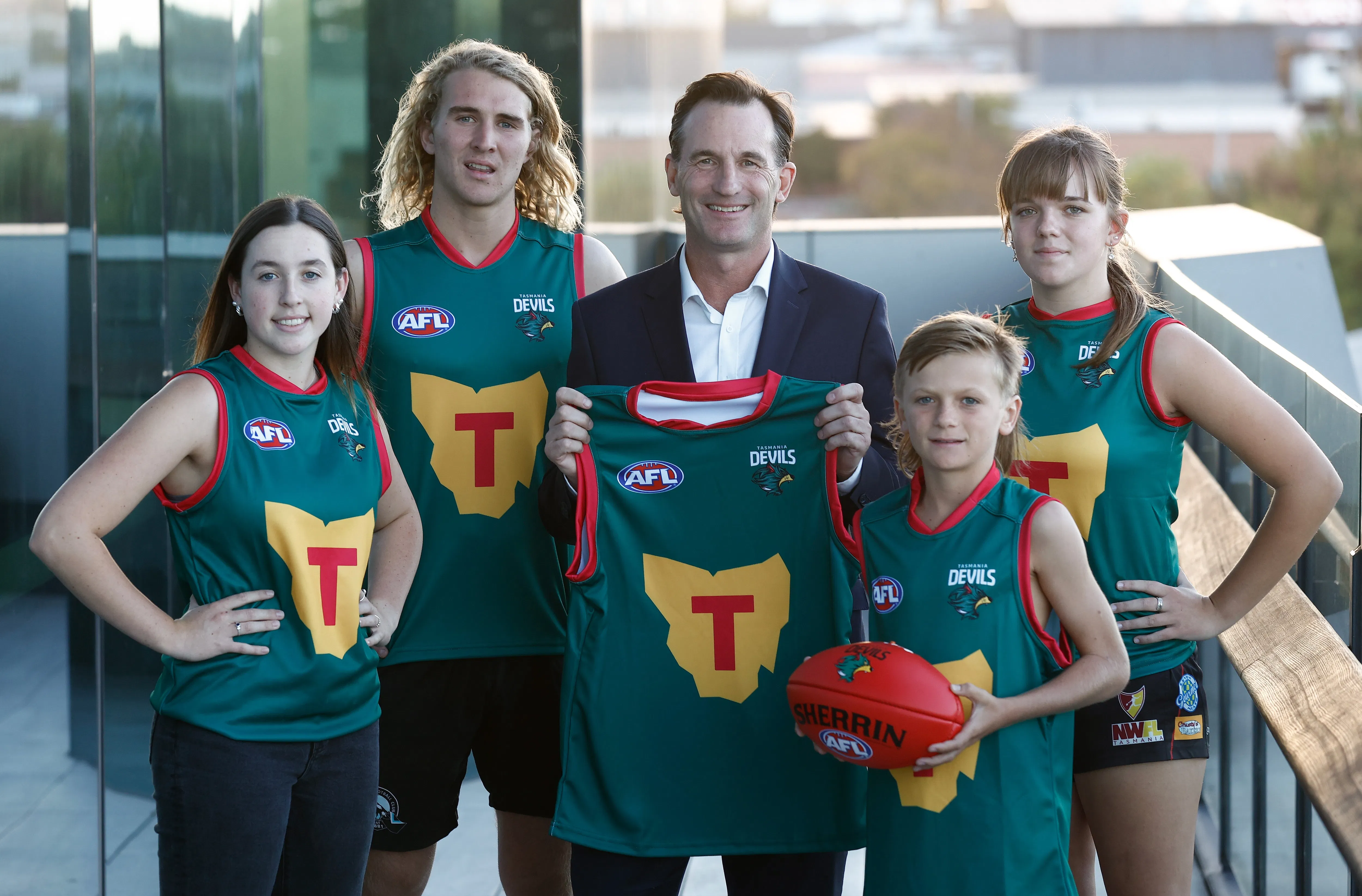 This footy team is so new the players didn't even know the club song - 1