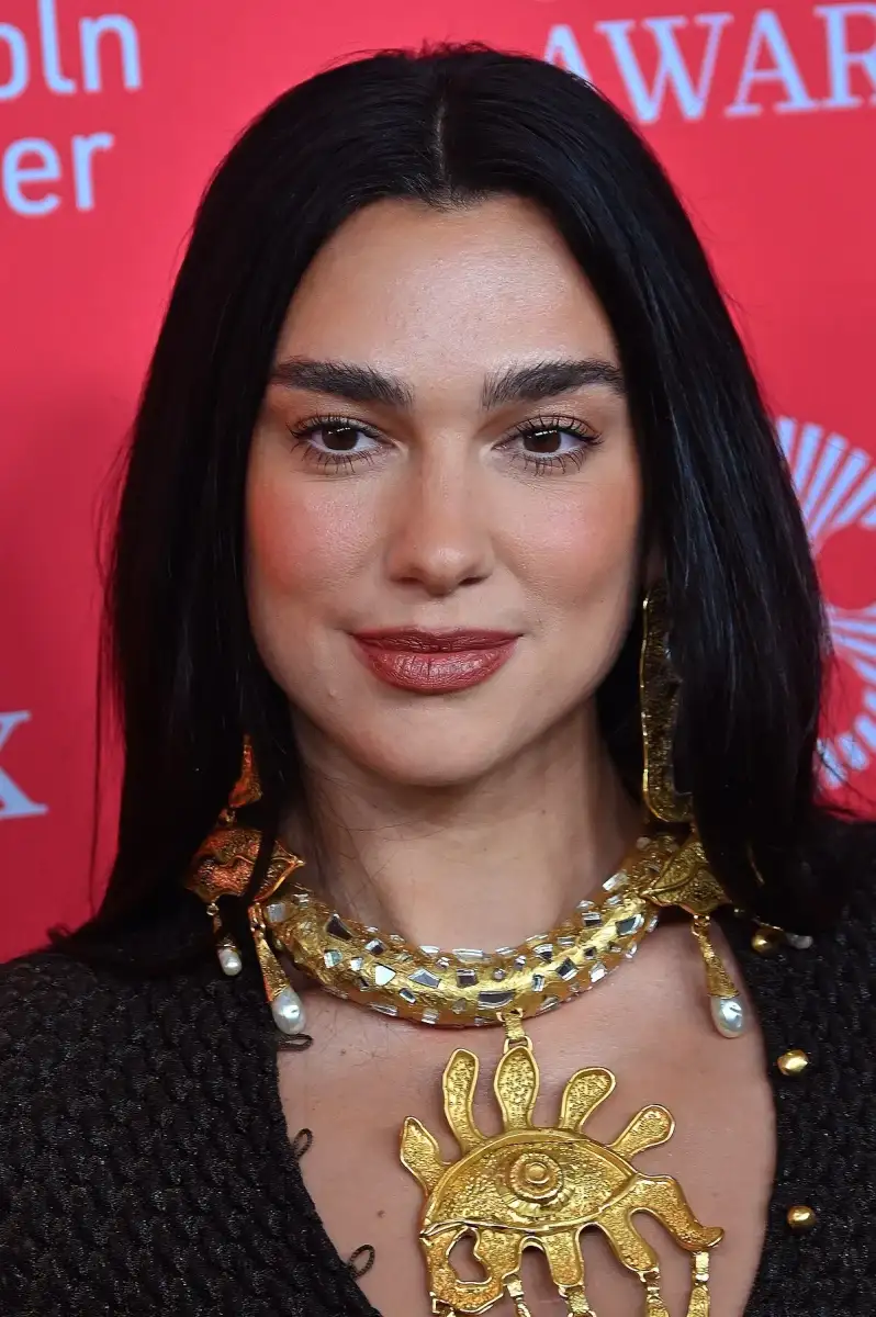 Dua Lipa's new husband Callum Turner 'broke down in tears as he saw her walk down the aisle as the couple married in modest legal ceremony with just eight guests before celebrating with a quiet family dinner' - 2