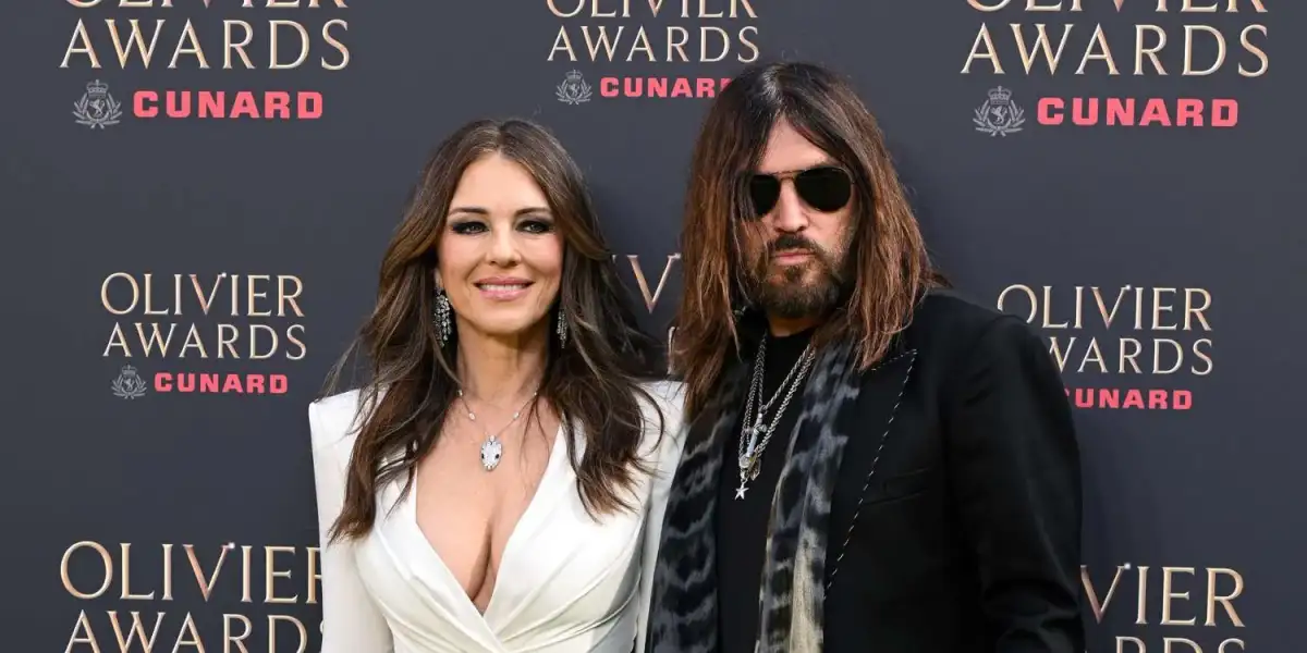 Elizabeth Hurley looks sensational in a plunging gown as she joins boyfriend Billy Ray Cyrus and son Damian at the star-studded Olivier Awards - 3