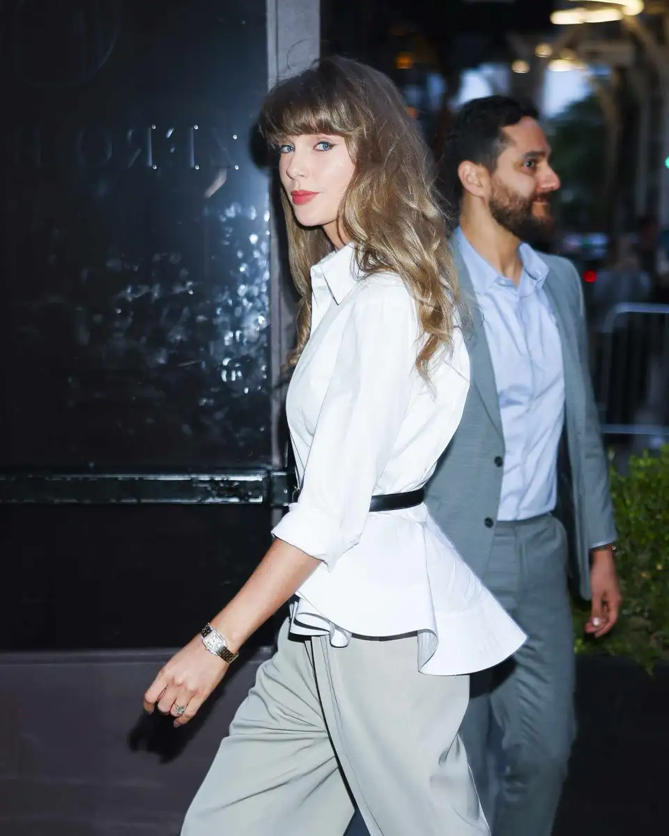Taylor Swift steps out in bridal white AGAIN as the unusual way guests are receiving invites to Travis Kelce wedding is revealed - 4